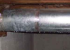condensation collecting on an HVAC vent in a humid Breckenridge  basement