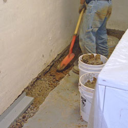 Digging a trench for a French Drain system in Steamboat Springs 