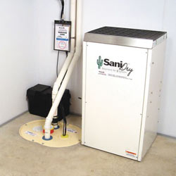 Sump pump system, dehumidifier, and basement wall panels installed during a sump pump installation in Dillon 