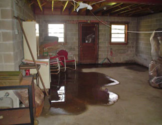 a flooded basement floor in a Silt  home