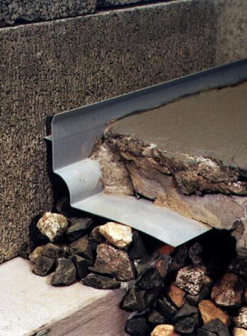 below foundation slab drain system for installing a French drain in Granby 
