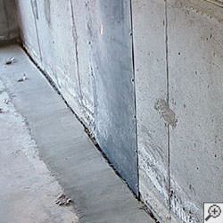 an ugly basement weeping tile drainage system that's clogged and not working in Rifle .