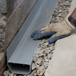 installing a drain tile system in a Eagle  home